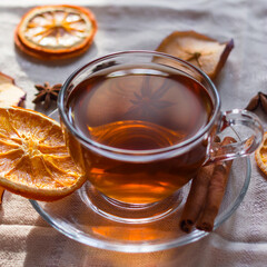 Cup of tea and slices of dried orange