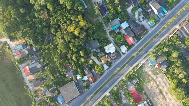 aerial view of road and home,beautiful nature in the morning,shot from top view,fly down from top to bellow