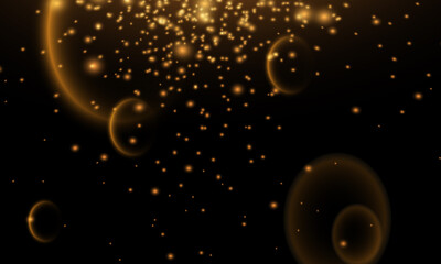 Gold bokeh, shiny glittering golden and silver stars. Glitter gold de-focused lights on black background. Background of bright glow bokeh. 