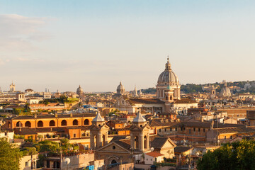 Fototapeta na wymiar City of Rome, Italy, at sunset in summer