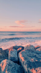 Seascape of rocky beach. Sea waves crash and splash on rocks. View of the sea, ocean.  View of the black sea, Batumi