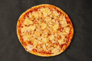 Pizza with chicken and pineapple