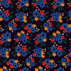 Fototapeta na wymiar Seamless pattern with bouquets of small flowers, leaves. Liberty floral print with various painted flowers, leaves on a dark background. Vector illustration.