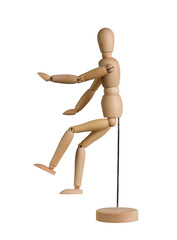 wooden mannequin with bent arms and legs on stand isolated on white background