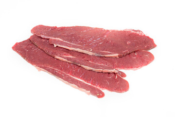 Three angus veal slices on a perfect white background
