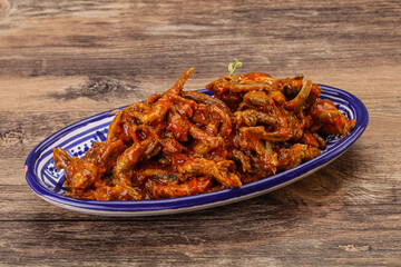 Canned anchovy in tomato sauce