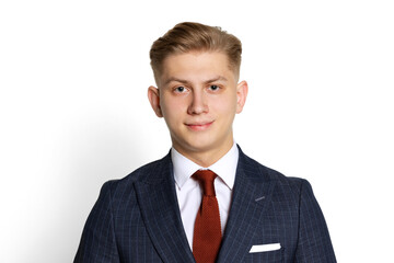 Half-length portrait of handsome young businessman, student, diplomat looking at camera isolated on white studio background. Human emotions, facial expression concept.