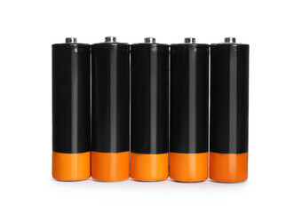 Many new AA batteries on white background