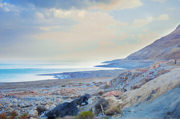 Fototapeta na wymiar mountains and dead sea at sunset of a sunny day