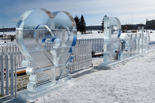 Heart love Barrie ice sculpture at 2022 Winterfest in Barrie called Hello Winter in Heritage Park on Kempenfelt Bay Barrie, Ontario, Canada - February 5, 2022