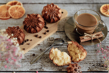 Romantic delicious and beautiful breakfast latte coffee and homemade muffins on wooden background