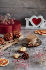 Food still life very tasty and beautiful breakfast coffee latte and homemade muffins on a wooden light background