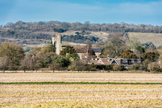 All Saints Church and the village of Birling near Maidstone in Kent, England with the north downs in the distance 
