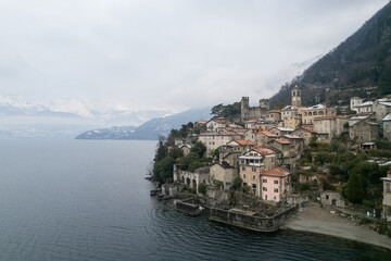 Fototapeta na wymiar Corenno Plinio on Lake Como looking at the north in winter conditions.