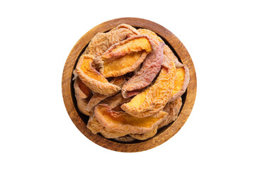 dried peaches in wooden bowl isolated on white background. Vegan food, top view.