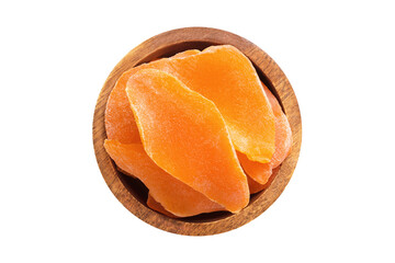 candied fruit, dried mango with sugar in wooden bowl isolated on white background. Vegan food, top view.