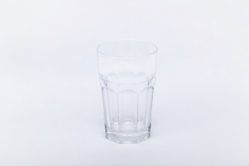 Glass with water on a white background