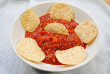 Tortilla Round Chips Served with Spicy Tomato Salsa	