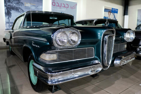 1958 Ford Edsel Pacer Blue Antique Classic Car teal view of bumper and head lights.