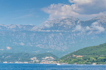 Scenic panoramic landscape view on Bay of Kotor, Montenegro with mountains at sundown. - 487396120
