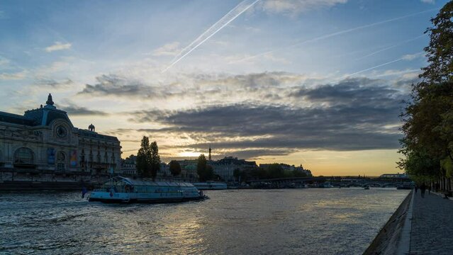 Colorful Sunset Over Paris Touristic Center Eiffel Tower Seine River and Boats Cruises Docks