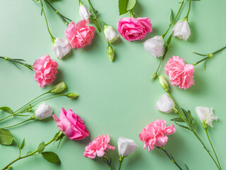Obraz na płótnie Canvas Pink flowers frame background