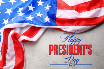 Fototapeta na wymiar Happy President's Day - federal holiday. American flag and text on grey background, top view