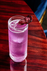 alcoholic cocktails at the bar on a wooden table