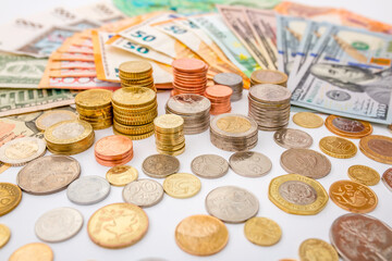 Money US dollars and Euro Coins, different monetary coins, a lot of different money finance banknotes of different countries