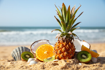 assorted of fresh fruit on the beach