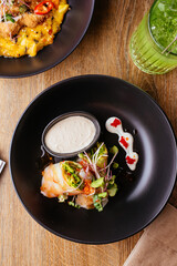 asian spring rolls with vegetables on a wooden background. resta