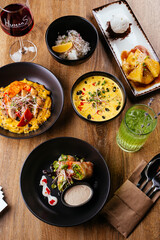 asian spring rolls with vegetables on a wooden background. resta