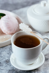 tea and sugar on a wooden stick