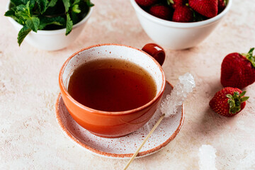 tea and sugar on a wooden stick