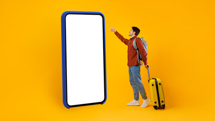 Tourist Guy Using Huge Cellphone With Empty Screen, Yellow Background