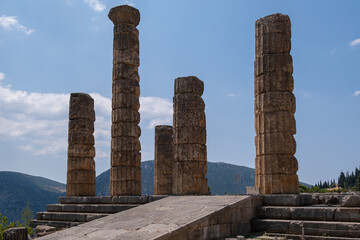 Famous Ancient Ruins - The Temple of Apollo in Delphi, Greece in a summer day, European travel