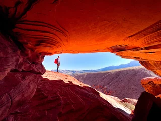 Wall murals Rood violet Hiker in Red Rock Park, Nevada