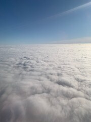 view of the clouds from the window of an airplane