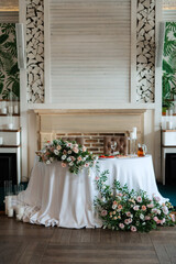 The presidium of the newlyweds in the banquet hall of the restaurant
