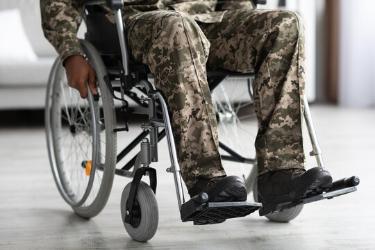 Legs Of Disabled African American Military Man In Wheelchair