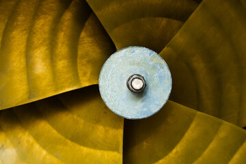 Five-bladed ship propeller close-up, with zinc corrosion protection in the center
