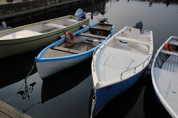Fototapeta premium Italy, Garda Lake: Resting boats in the small port of Malcesine.