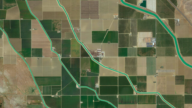 irrigation canals, fields, cultivated fields, ploughed fields and land consolidation looking down aerial view from above, bird’s eye view irrigation canals and fields, California, USA