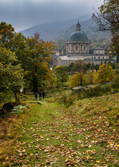 Scenic path in the woods leading to Oropa sanctuary, Piedmont, Italy