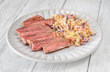 Beef steak with coleslaw salad