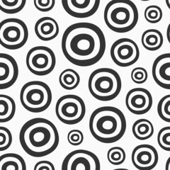 Hand drawn circles seamless pattern. Round brush strokes. Geometric shapes ornament. Flat design. Monochrome vector background.
