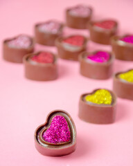 Obraz na płótnie Canvas Chocolate bonbons in the shape of hearts.