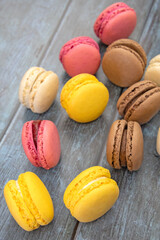 several macarons on a gray background