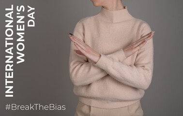 Break the bias symbol of woman's international day. Crossed hands. Woman arms crossed to show...