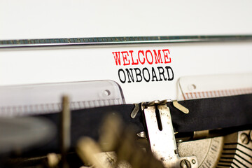 Welcome onboard and support symbol. Concept words Welcome onboard on white paper typed on retro typewriter. Beautiful white background. Copy space. Business and Welcome onboard concept.